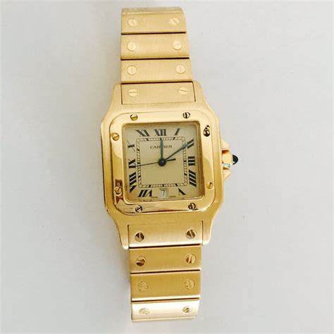 cartier santos 100 18k gold.